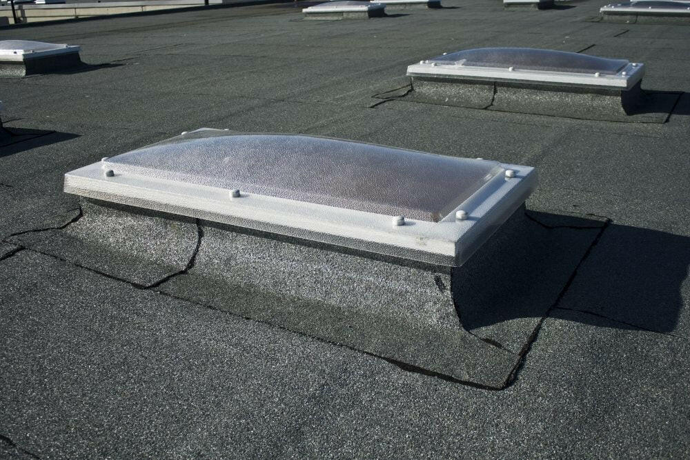 1050 x 1050 mm Polycarbonate Fixed Dome Rooflight by Mardome Trade.